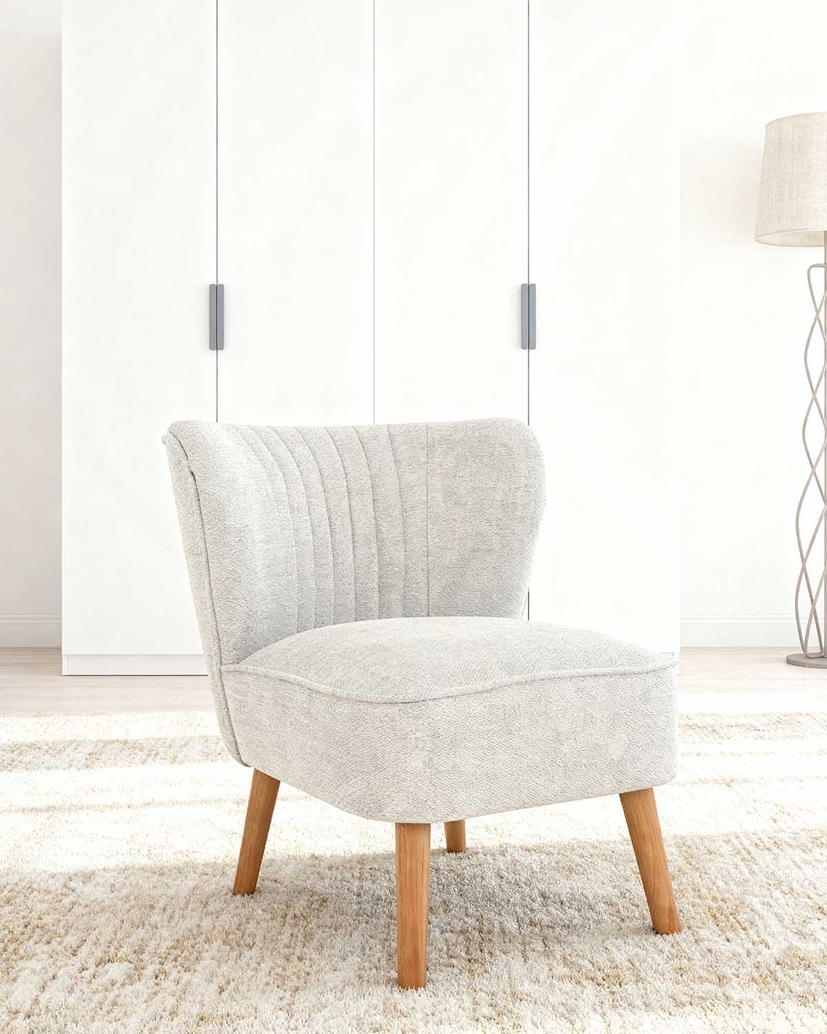 Sillón tapizado en tela Eve