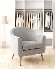 Sillón tapizado en tela Nelda