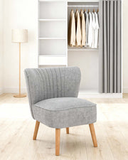 Sillón tapizado en tela Eve