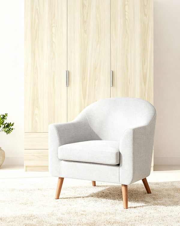 Sillón tapizado en tela Nelda