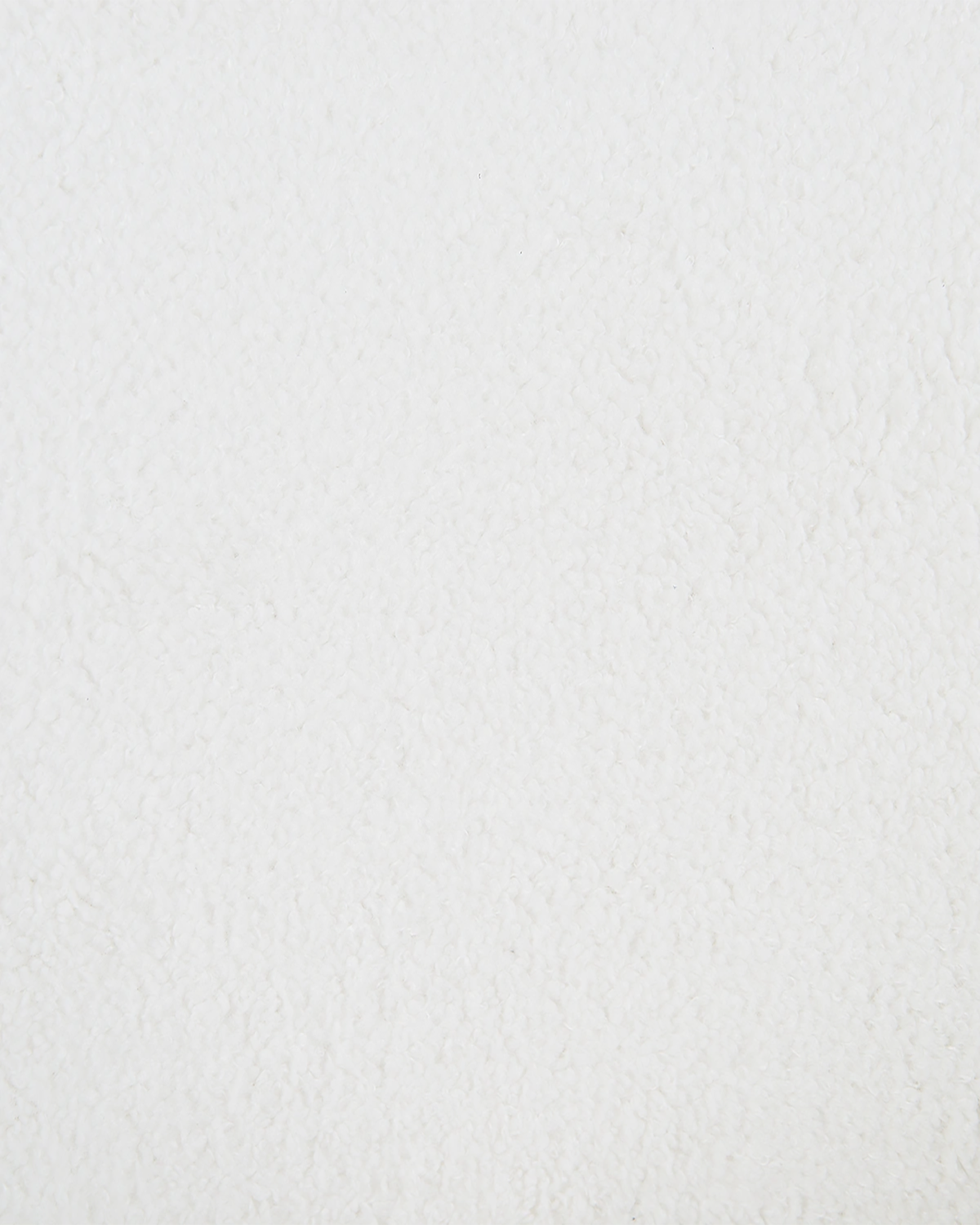 Sillón tapizado en teddy Emma