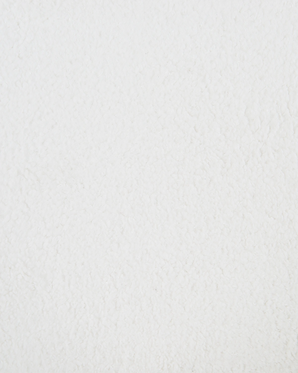 Sillón tapizado en teddy Emma